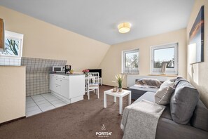 Living area - Comfortable vacation apartment Twilling I in Sankt Peter-Ording with garden (Sankt Peter-Ording)