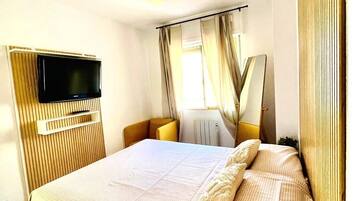 Blackout curtains, iron/ironing board