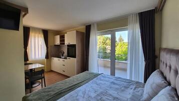 Comfort Apartment, 1 Queen Bed, Balcony, City View | Blackout curtains, iron/ironing board, free WiFi