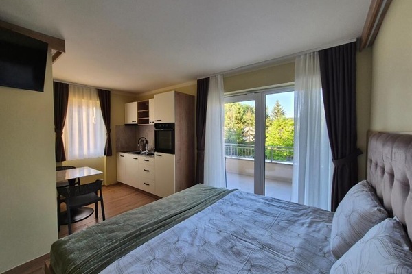 Comfort Apartment, 1 Queen Bed, Balcony, City View | Blackout drapes, iron/ironing board (on request), WiFi (free)