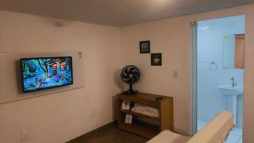 Casa família, cozinha, vista para o jardim | Área de estar