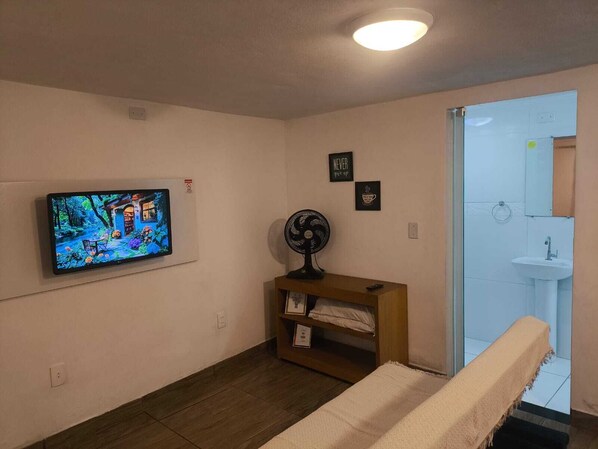 Casa família, cozinha, vista para o jardim | Área de estar