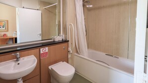 A bathroom with a sink, toilet, and bathtub. - Jubilee First-floor Single Bedroom (Penrith)