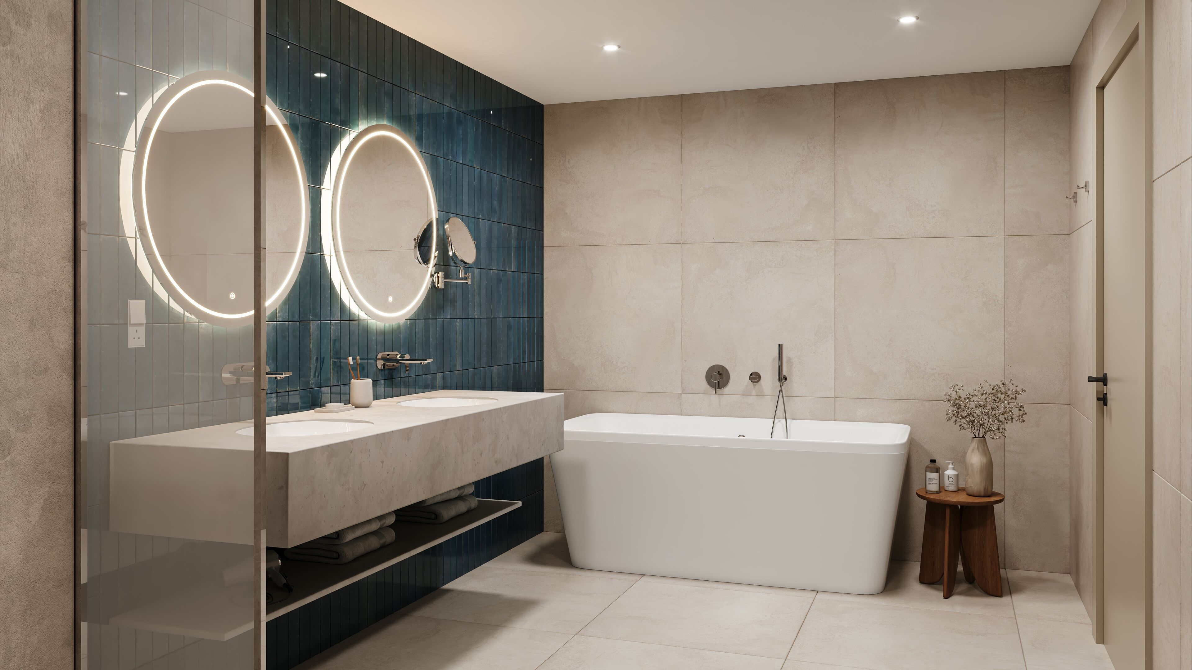 A modern bathroom with two sinks, a bathtub, and a large mirror with circular lights.