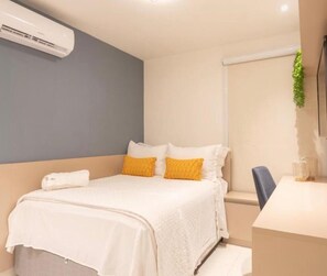 Classic Double Room, Patio, Beach View | In-room safe, desk, laptop workspace, free WiFi