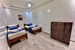 2 habitaciones, tabla de planchar con plancha, wifi y ropa de cama 