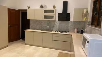 Fridge, oven, electric kettle, toaster