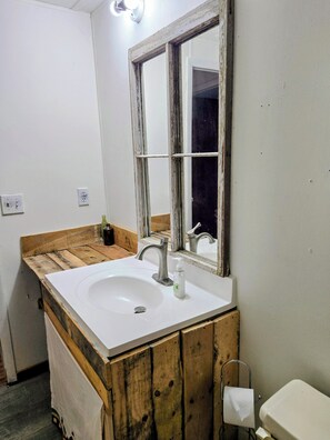 Bathroom - Adventures — Ideal for Traveling Nurses, Hunters, Families, and Nature Lovers.” (Bethel Springs)