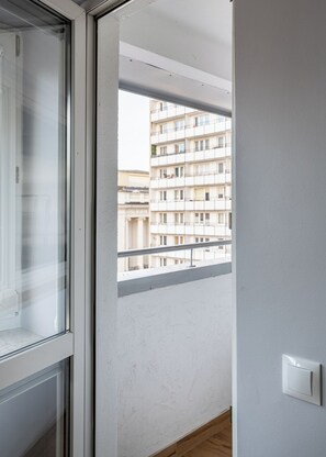 Apartamento, balcón | Zona de estar