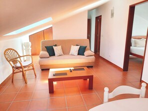 Family Studio | Living area | 50-inch LCD TV with satellite channels