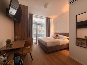 Habitación cuádruple | Escritorio, tabla de planchar con plancha y wifi gratis