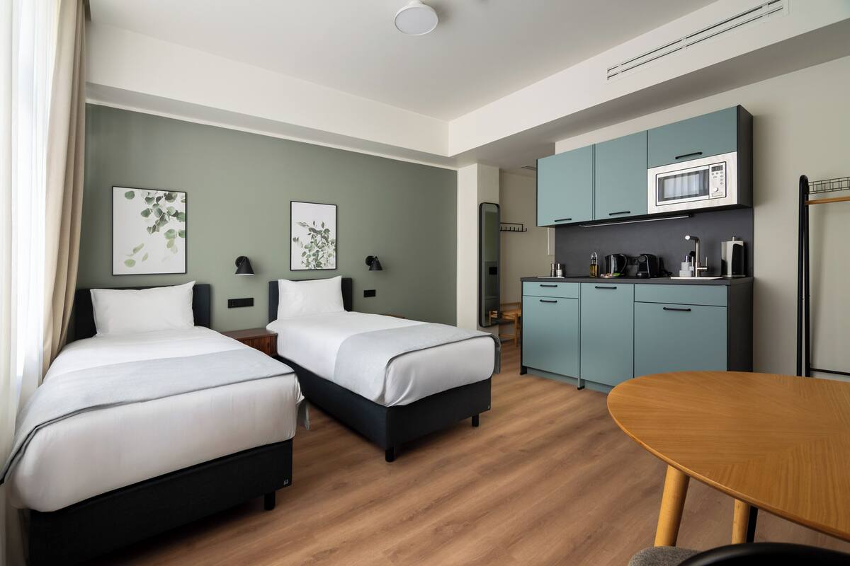 Comfort Twin Suite | Desk, laptop workspace, blackout drapes, WiFi (free)
