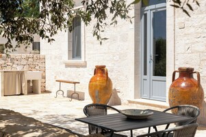 Appartamento, patio, lato piscina | Terrazza/patio