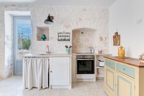 Superior Apartment, Patio | Private kitchen | Full-sized fridge, stovetop, electric kettle, toaster - Borgo Altobello (Cisternino)