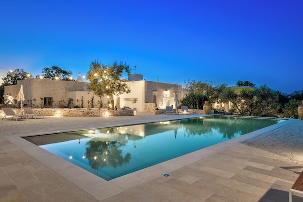 Seasonal outdoor pool, open 9:30 AM to 7:00 PM, pool umbrellas