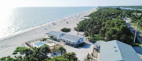 On the beach, sun loungers, beach towels