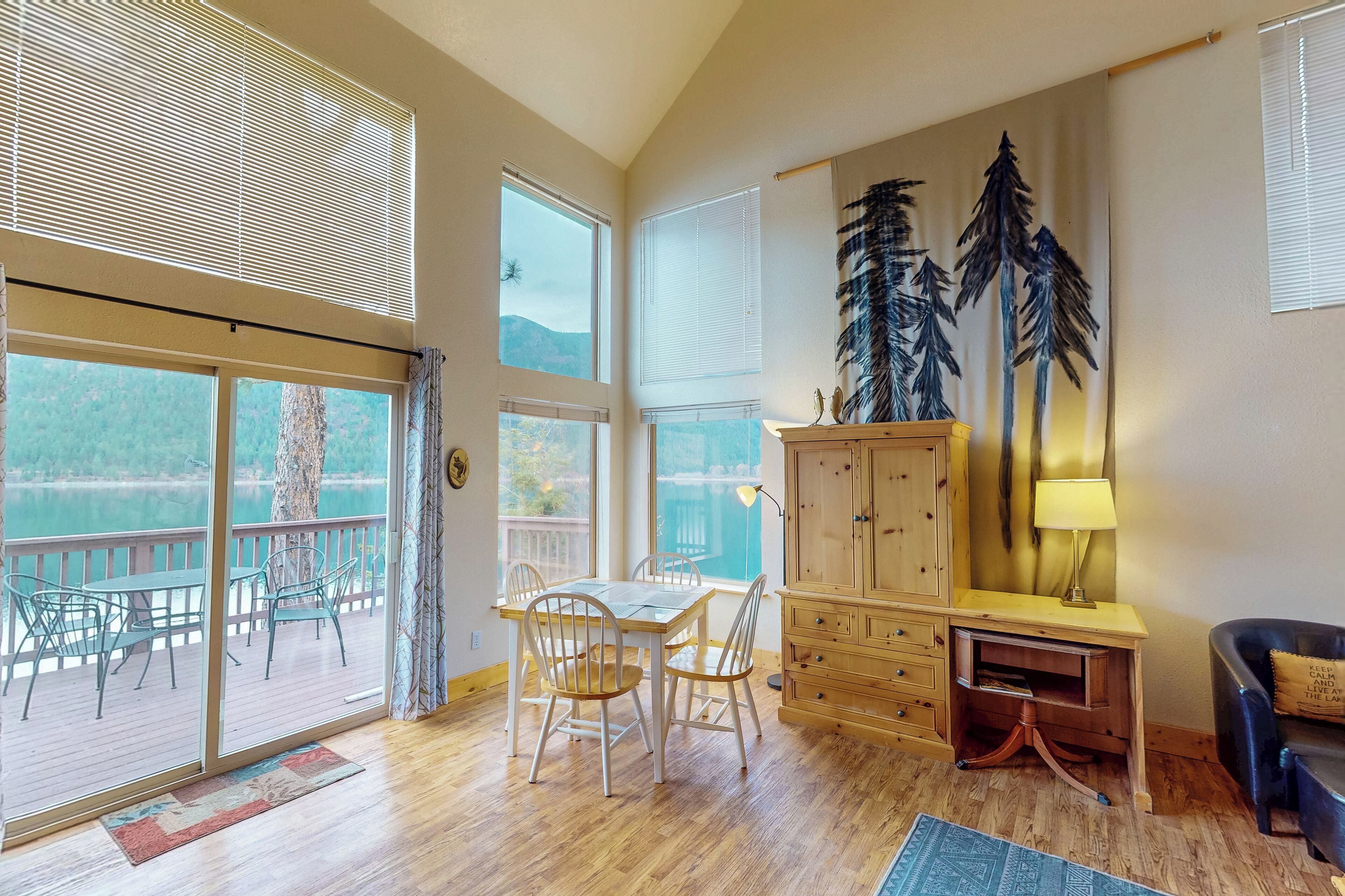 View from the kitchen looking towards dining area at out to lake