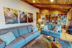 TV, fireplace - "Sunrise" a lakefront retreat with stunning views, private dock, deck, full kitchen, and cozy spaces—perfect for a relaxing Wallowa Lake getaway! (Joseph)