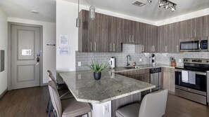 Fridge, dining tables - Landing | Beautiful 2BD, Clubhouse (Arlington)