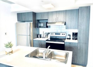 Fridge, cookware/dishes/utensils - Romema *201* - Condo Luxe 1 bdr (Montreal)