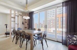 Penthouse, Balcony, City View | Dining