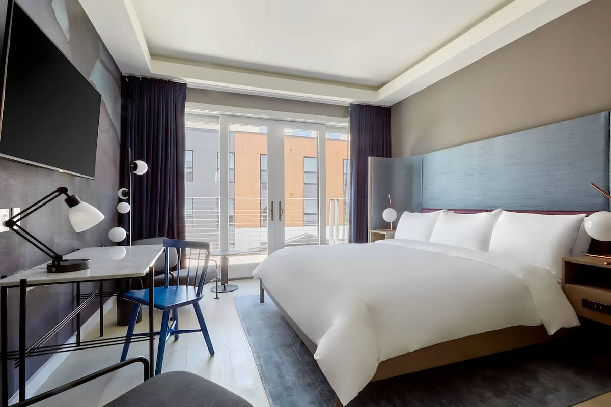 Penthouse, Balcony, City View | In-room safe, blackout drapes, iron/ironing board, free WiFi