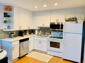 Fridge, coffee/tea maker, cookware/dishes/utensils - Folly River Condo -  Pool, Dock, Steps to CenterSt (Charleston)