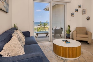 Villa, Sea View | Living area | 50-inch LED TV with cable channels - Villas Residences by Playa Caracol Resorts (Punta Chame)