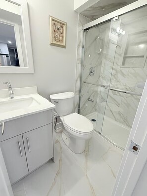 Bidet, towels, soap, toilet paper - Modern & Cozy 2 Bedrooms Basement Suite +Kitchen and Parking- Separate Entrance (Milton)