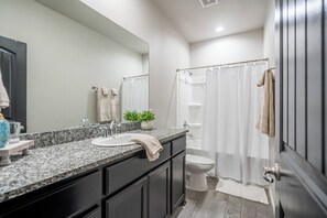 Hair dryer, towels, soap, toilet paper