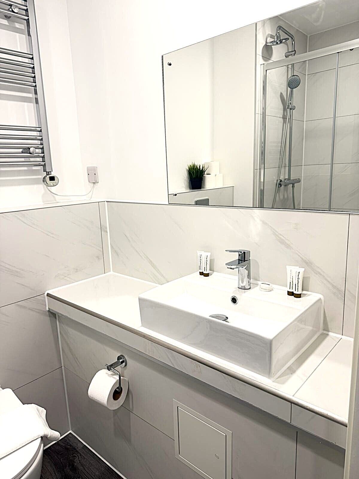 Shower, towels, soap, shampoo