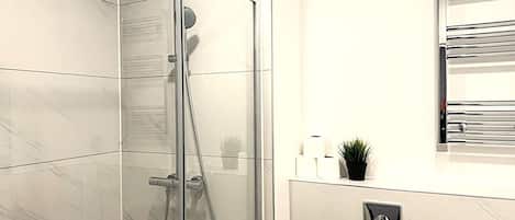Shower, towels, soap, shampoo
