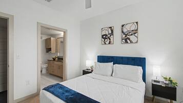 1 bedroom, desk, iron/ironing board, travel cot