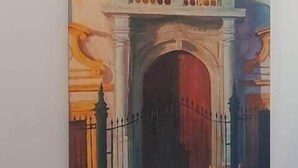 A painting of a classical building facade with columns, a balcony, and a window. - Jupiter, apartment in historic building in San Roque neighborhood (Seville)