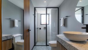 A modern bathroom with a large sink, a toilet, and a shower area. - Michoacan Space Lovely Apartment With Balcony (Mexico City)