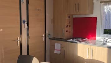 Refrigerador y parrilla de estufa