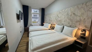 Basic Quadruple Room, 2 Double Beds, Shared Bathroom | Desk, free WiFi