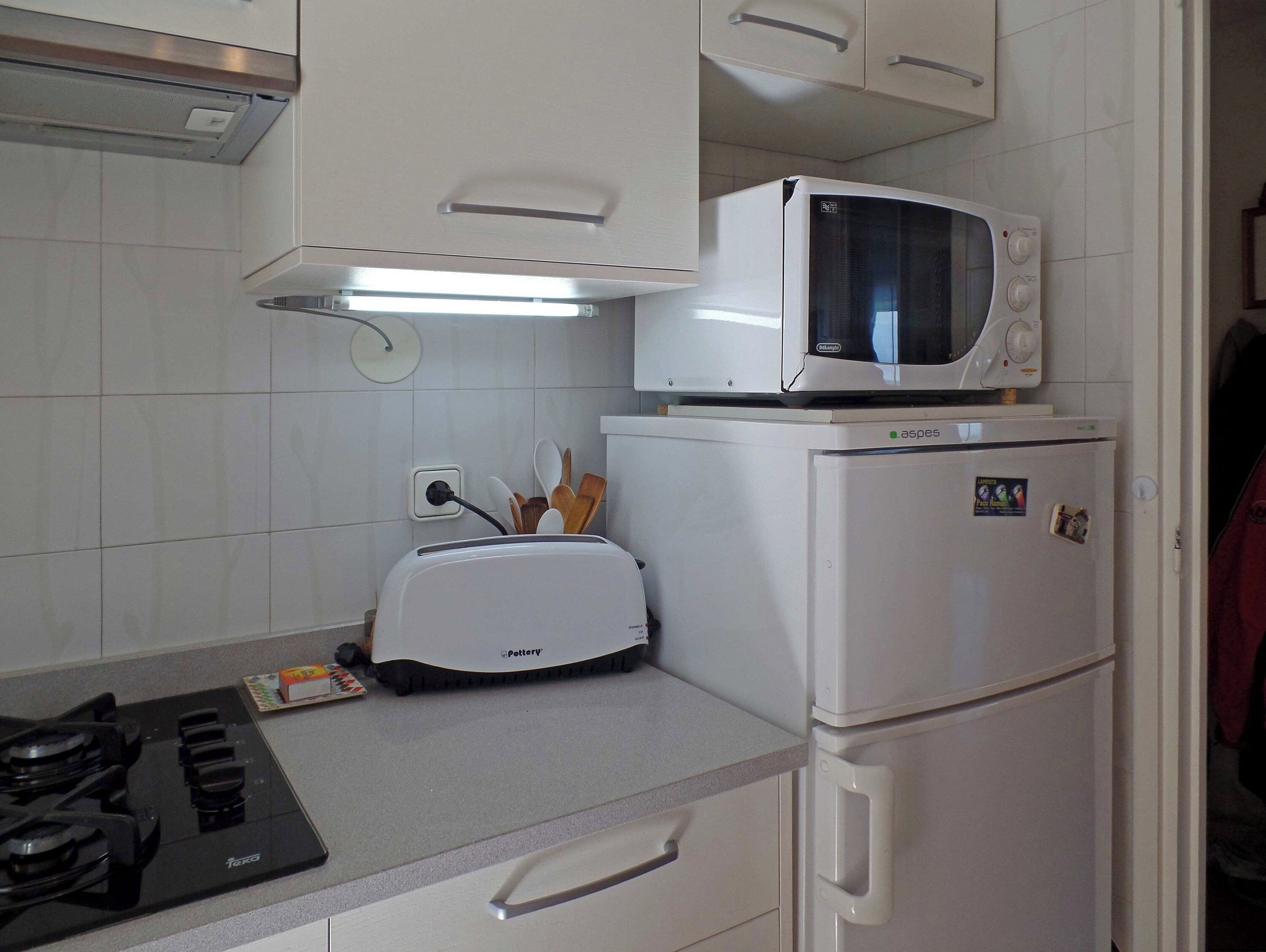 Fridge, microwave, coffee/tea maker, toaster