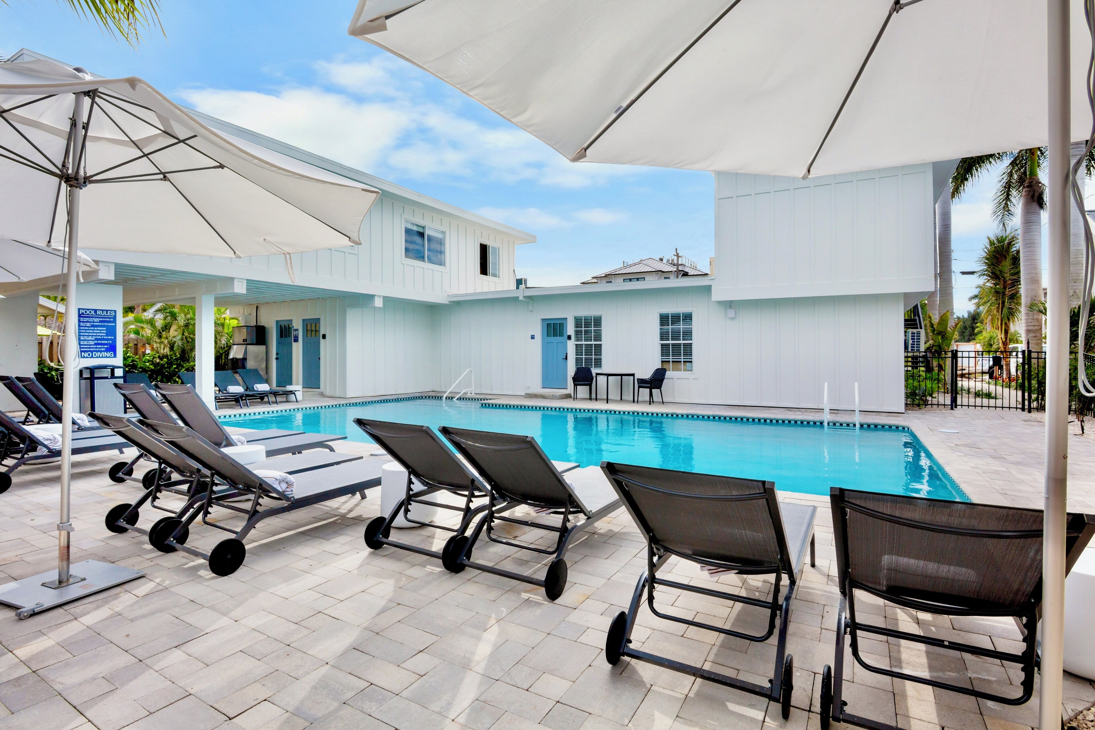 Outdoor pool, open 8:00 AM to 9:00 PM, pool umbrellas, sun loungers