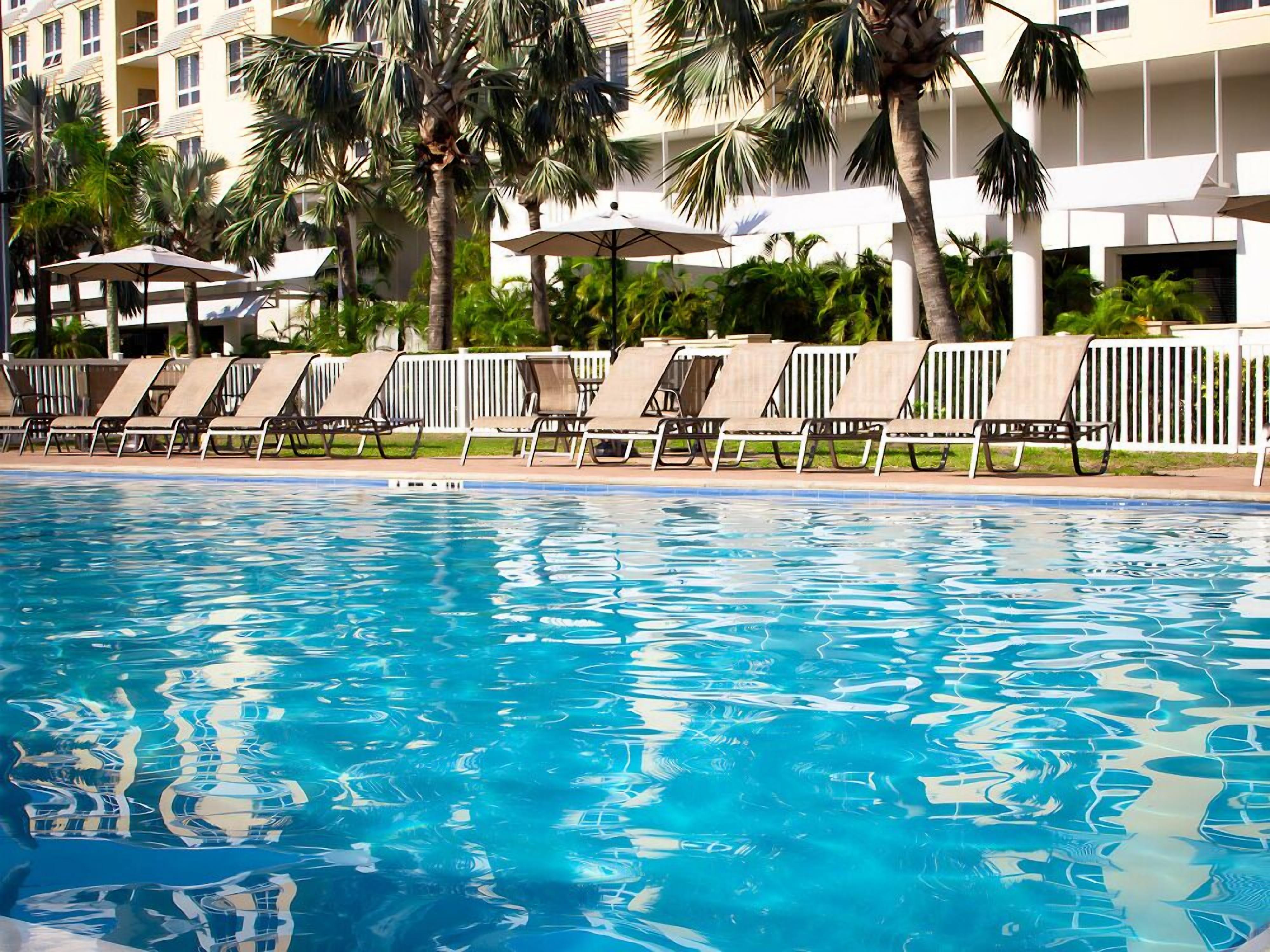 Outdoor pool, open 8:00 AM to 9:00 PM, pool umbrellas, sun loungers