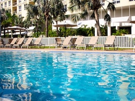 Outdoor pool, open 8:00 AM to 9:00 PM, pool umbrellas, sun loungers