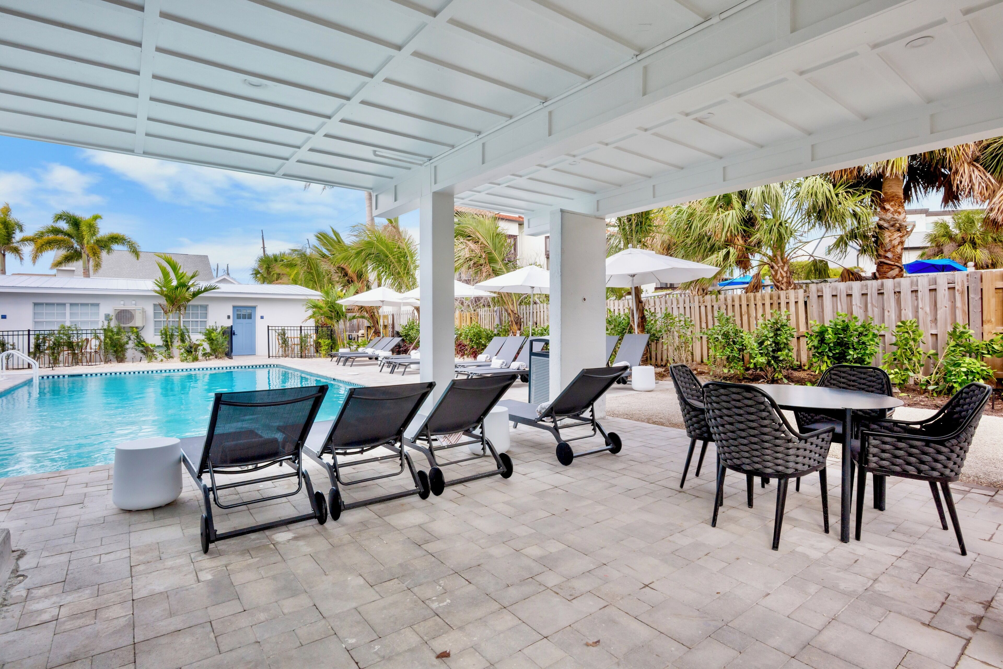 Outdoor pool, open 8:00 AM to 9:00 PM, pool umbrellas, pool loungers