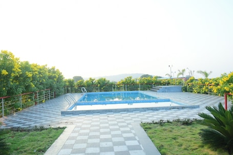 Outdoor pool. Paradise Carnival Agro Tourism Centre