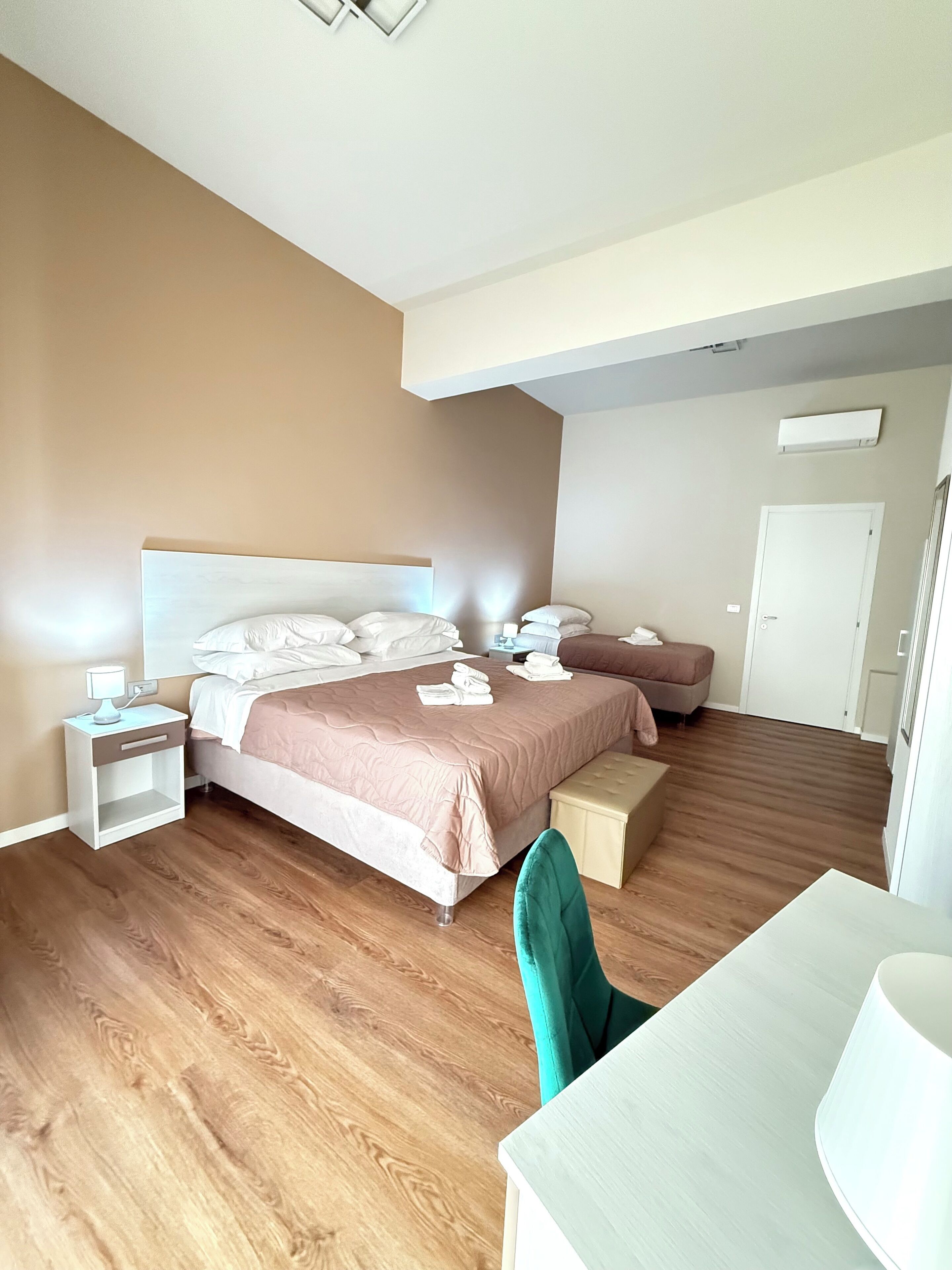 Deluxe Room, City View | Desk, laptop workspace, blackout drapes, iron/ironing board