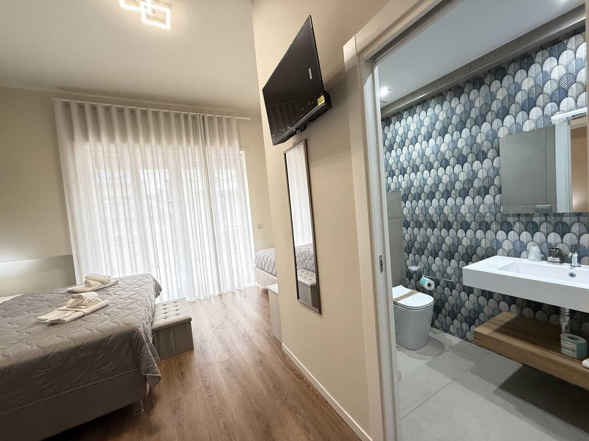 Luxury Room, City View | Desk, laptop workspace, blackout drapes, iron/ironing board