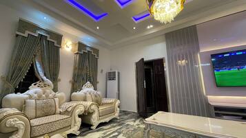 Superior Duplex, Non Smoking, Balcony | Living area | 45-inch Smart TV with satellite channels, video-game console, Netflix