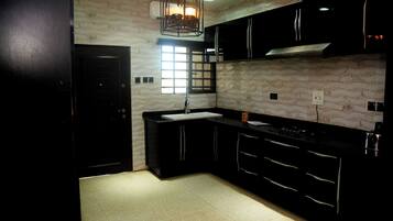 Superior Duplex, Non Smoking, Balcony | Private kitchen | Full-size fridge, microwave, oven, electric kettle