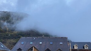 A building with multiple roof levels, each with skylights. - MAISON GERMÈS - CENTRAL & STANDING (capacity 15 people) - Near Parking (Bagnères-de-Luchon)
