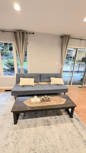 Living area - Master bedroom with en-suite bathroom, and a shared kitchen and living room (North Vancouver)
