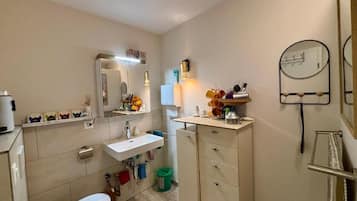 Hair dryer, towels, soap, toilet paper